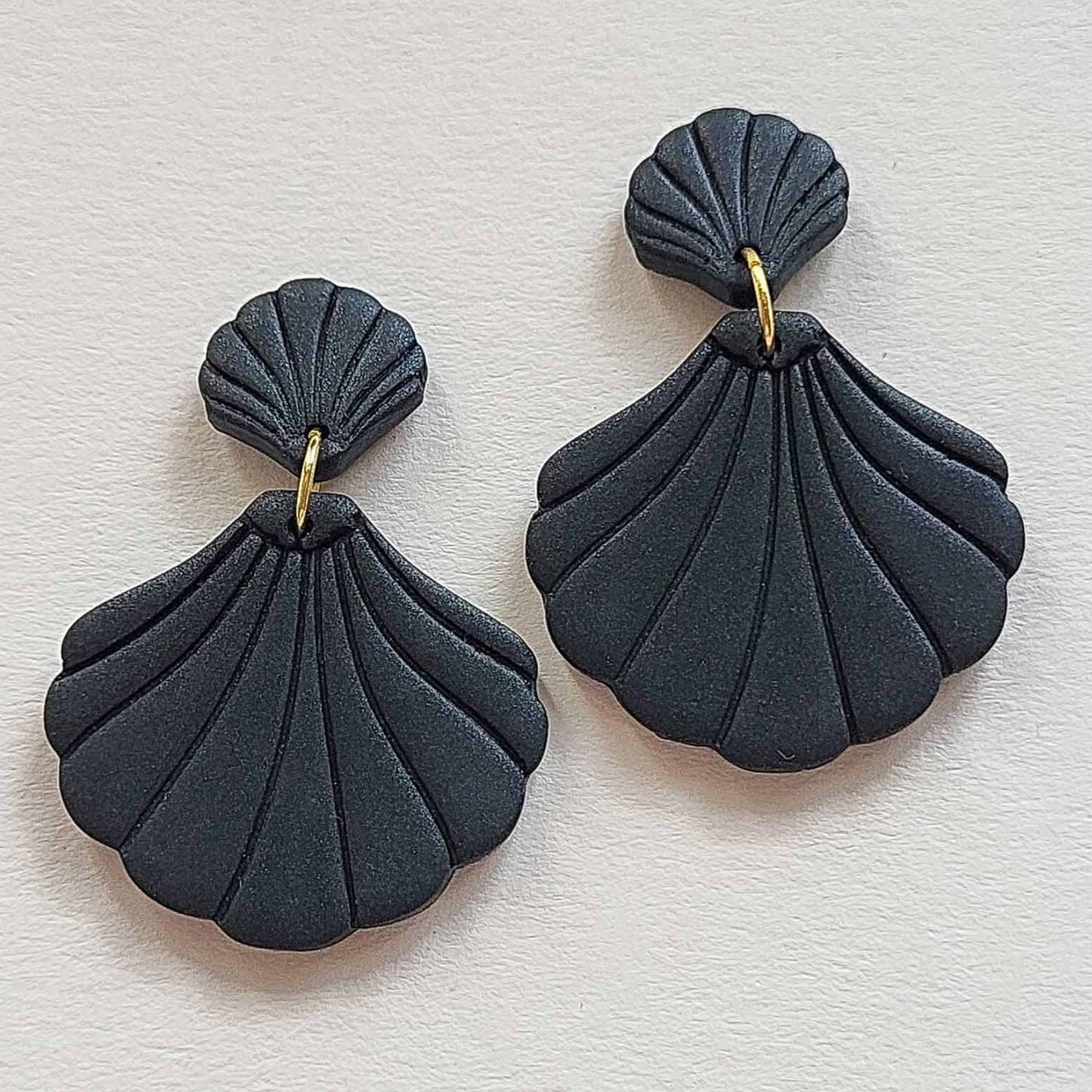 Black shell clay earrings