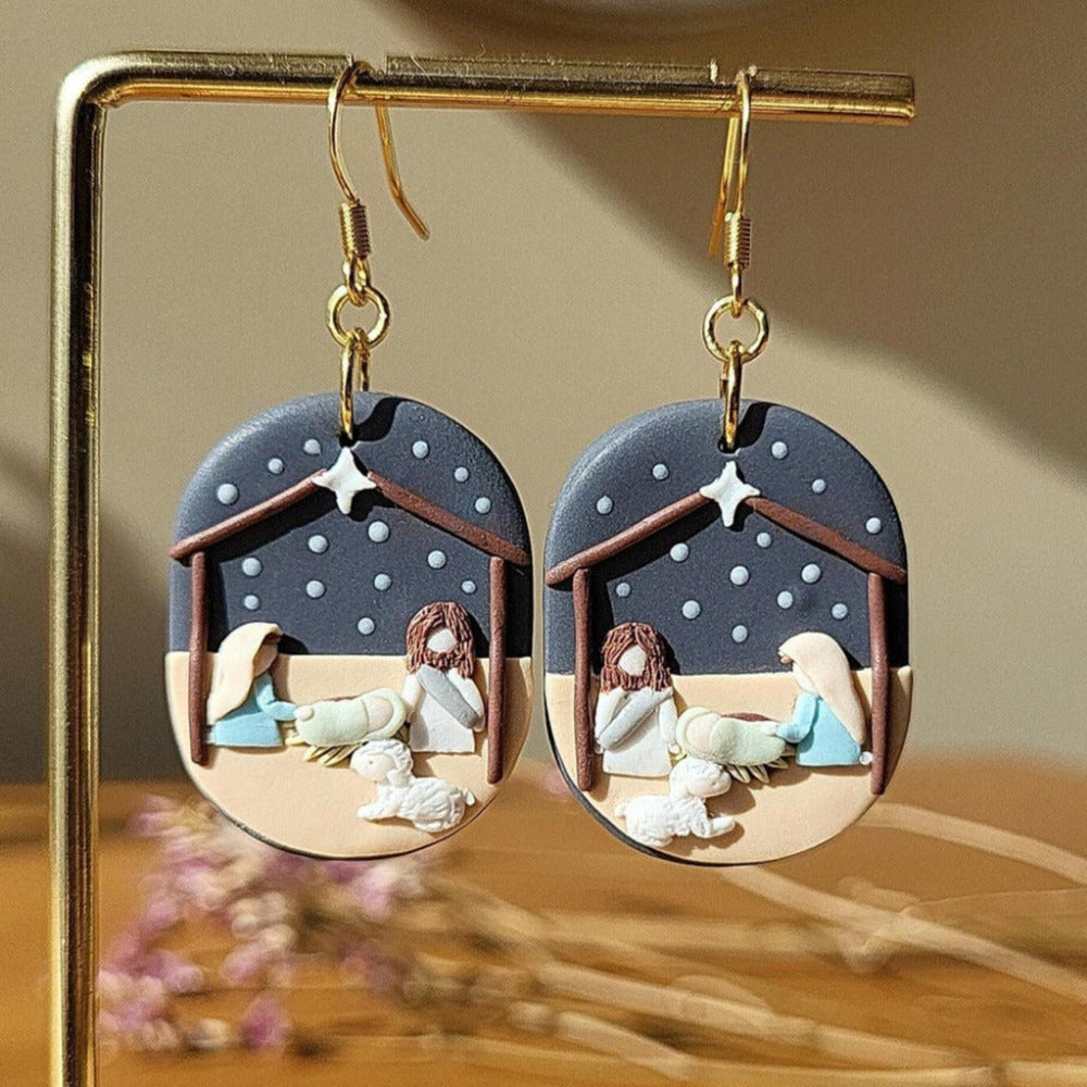 The nativity scene earrings are handmade from polymer clay with surgical stainless steel ear hooks. They are a cute unique Christmas gift for Christian women.