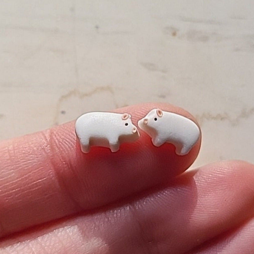 Tiny pig stud earrings