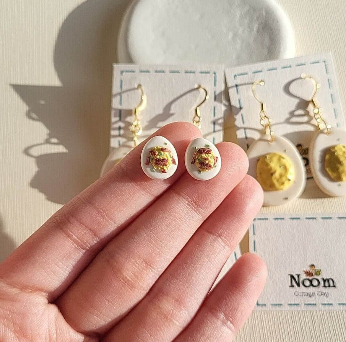 Deviled egg stud earrings