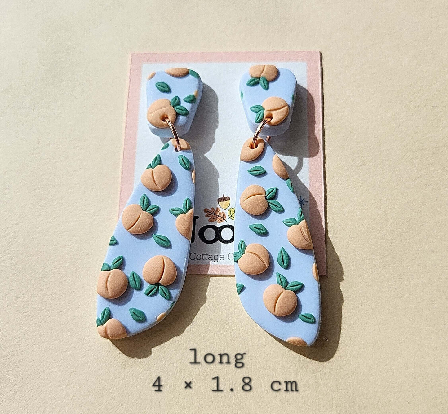 Drop peach earrings clay
