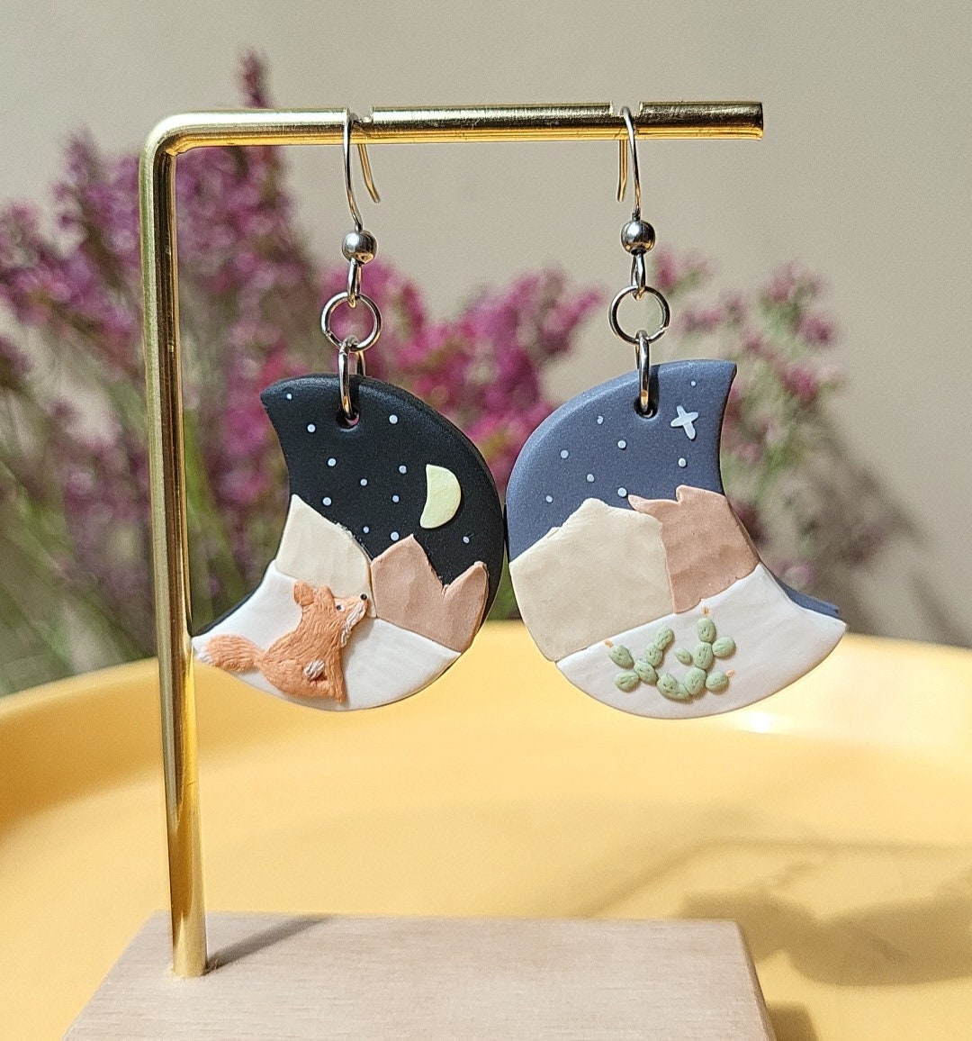 red fox earrings in desert mountain