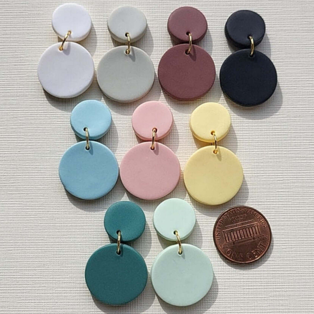 Minimalist circle polymer clay earrings in pastel colors and neutral colors