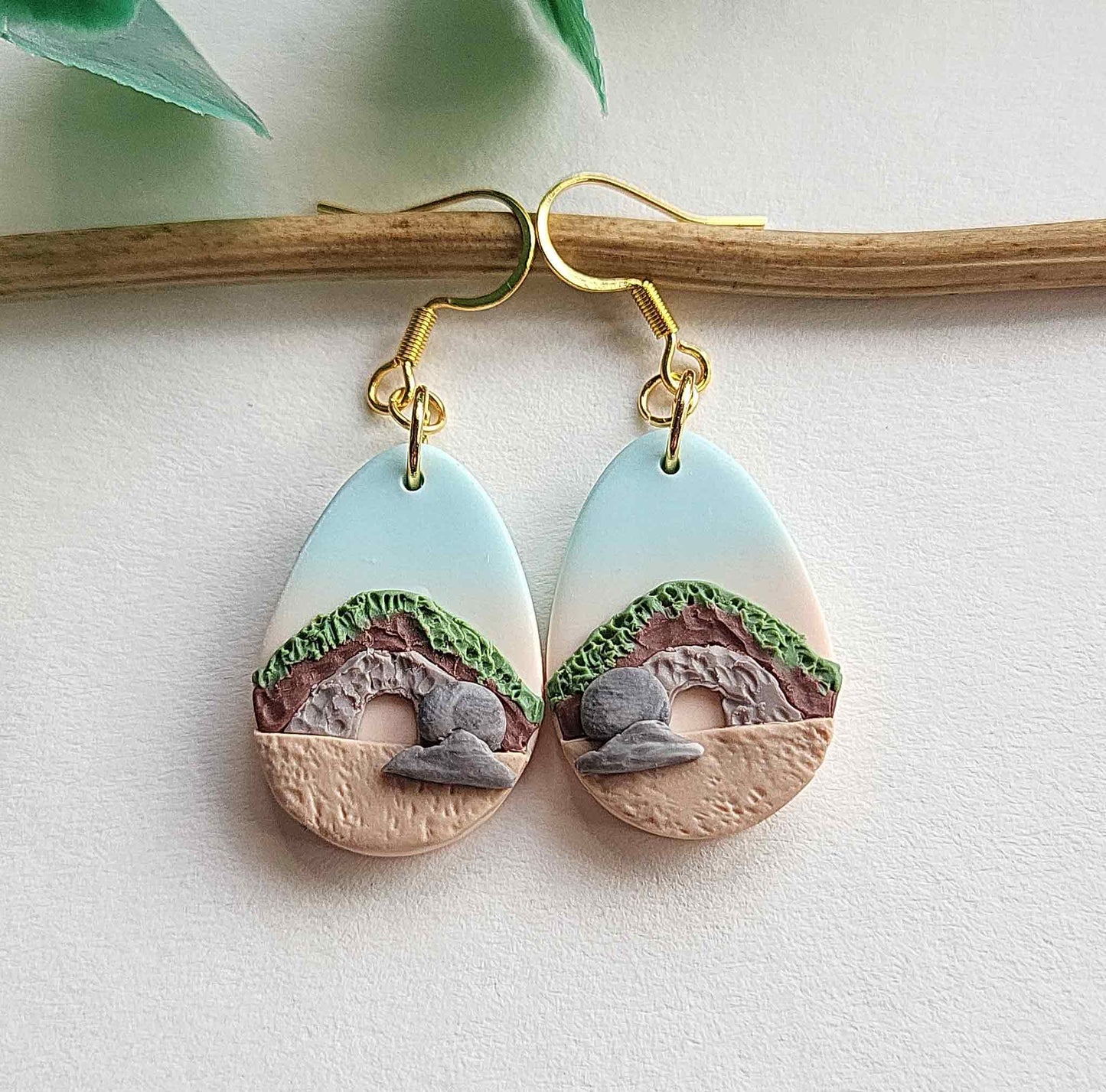 Resurrection earrings are handmade from polymer clay with surgical stainless steel ear wires.