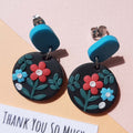 Cute boho wild floral earrings on black 