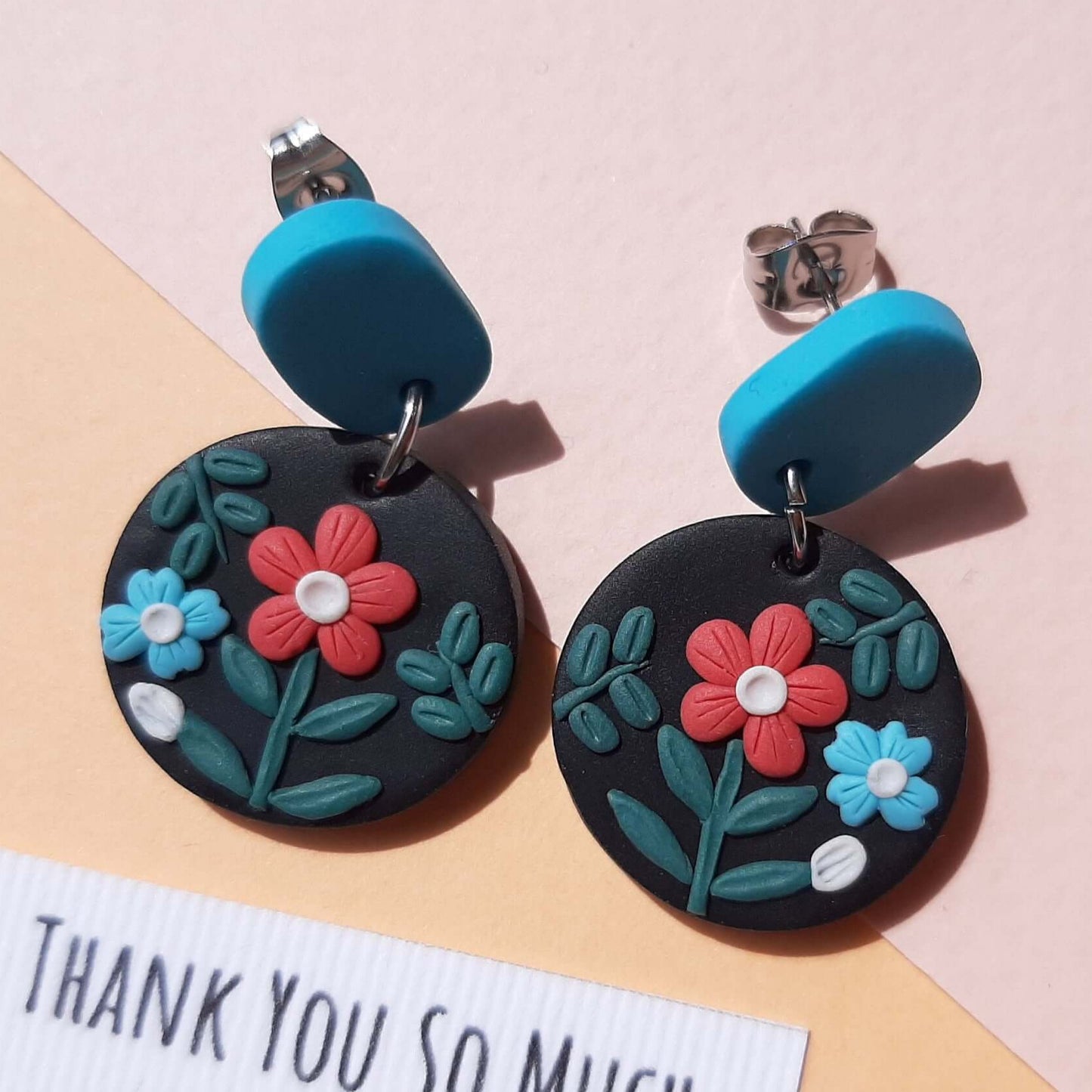 Cute boho wild floral earrings on black 