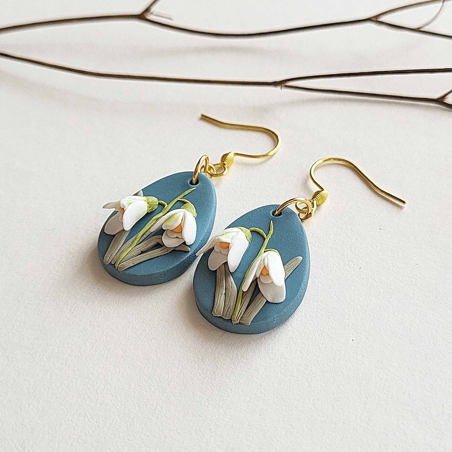 White floral earrings