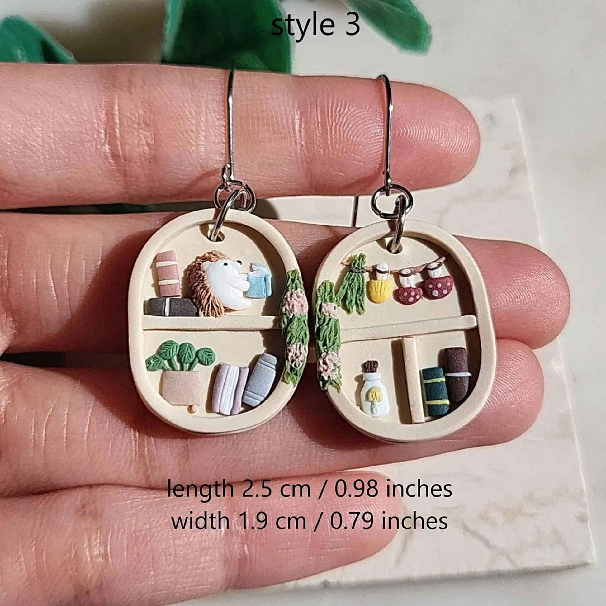 Cottagecore bookshelf earrings and plants