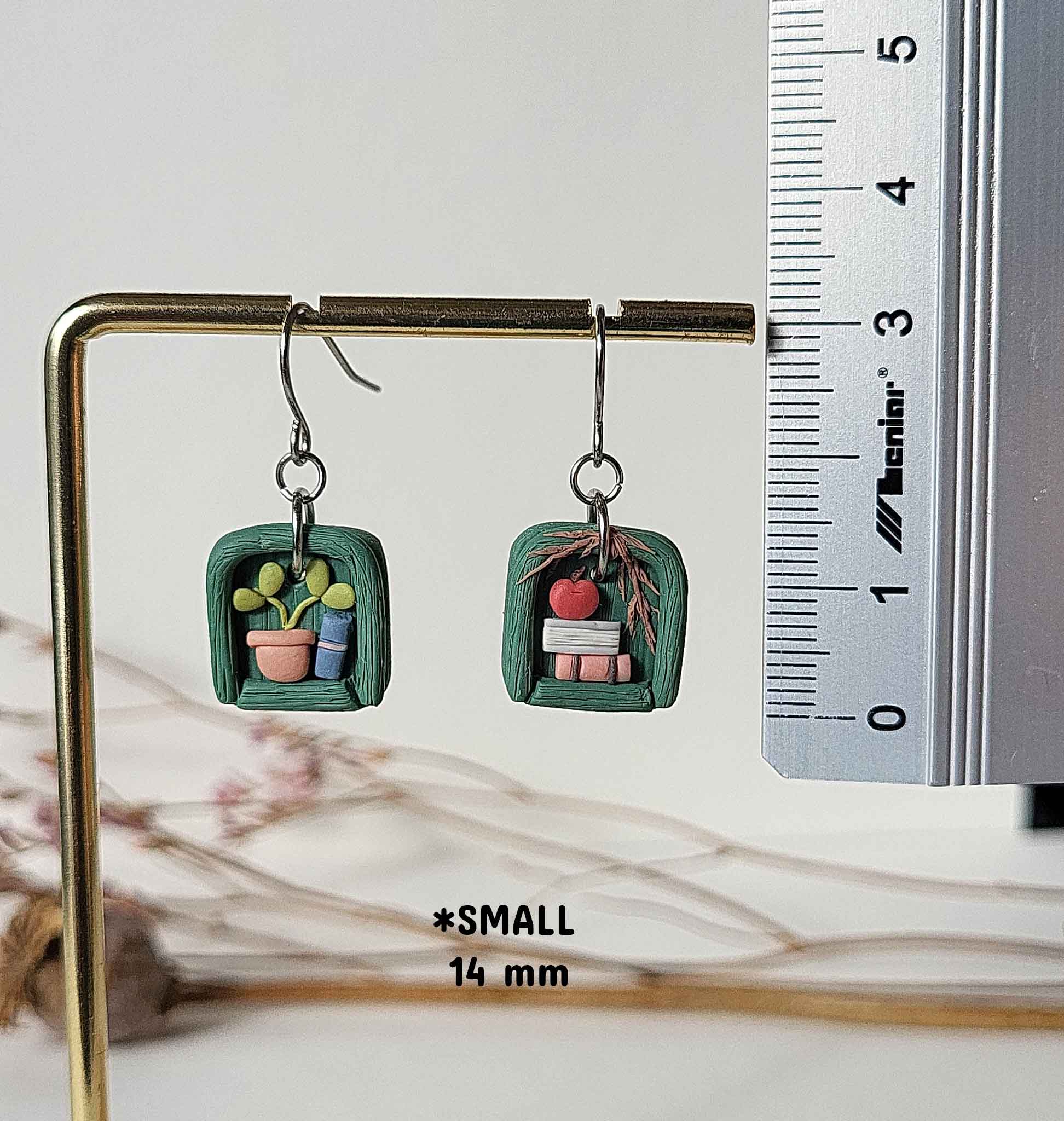 Handmade bookshelf and plant earrings