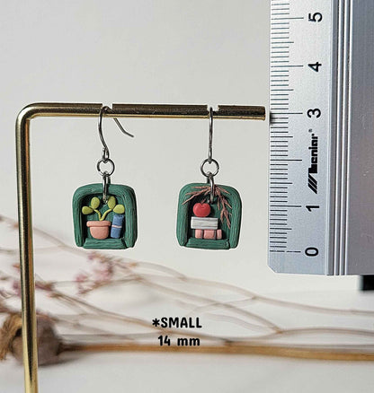 Handmade bookshelf and plant earrings