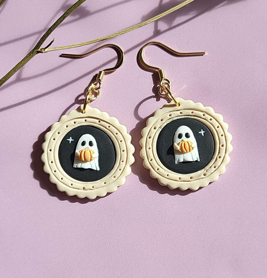 Cute ghost earrings in photo frame