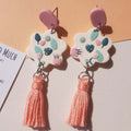 Dangle leaf earrings with cotton tassels