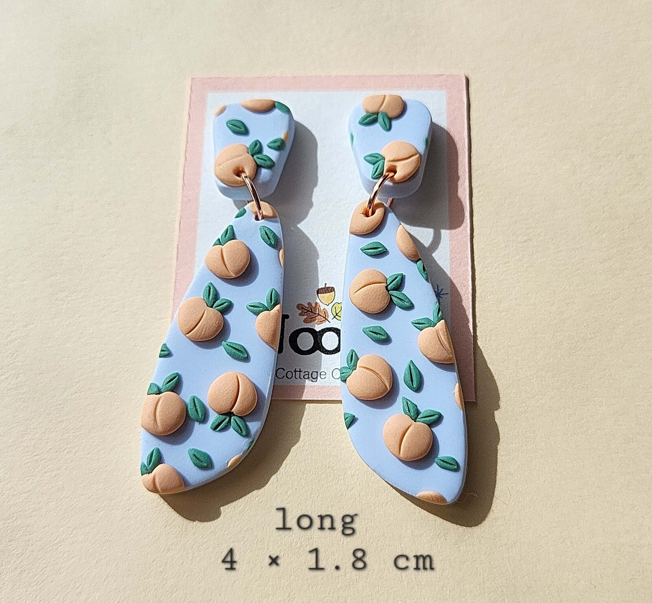 Drop peach earrings clay