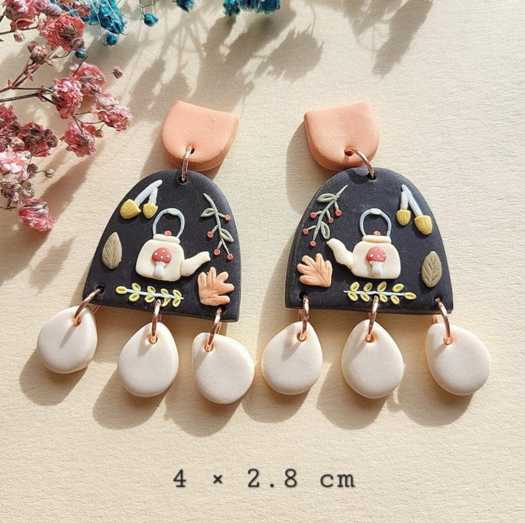 Handmade cottagecore earrings are handcrafted from polymer clay. 