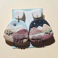 Grizzly bear earrings in desert