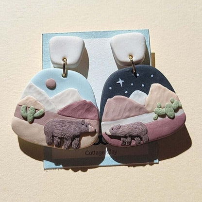 Grizzly bear earrings in desert