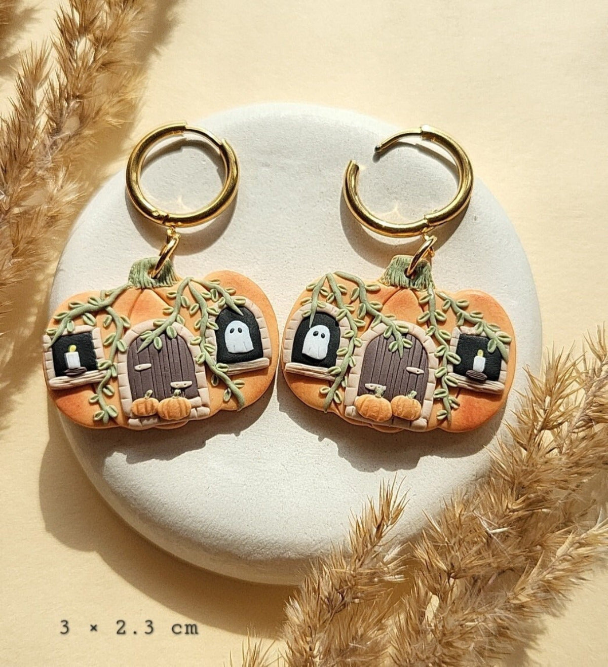 Cute haunted pumpkin house earrings