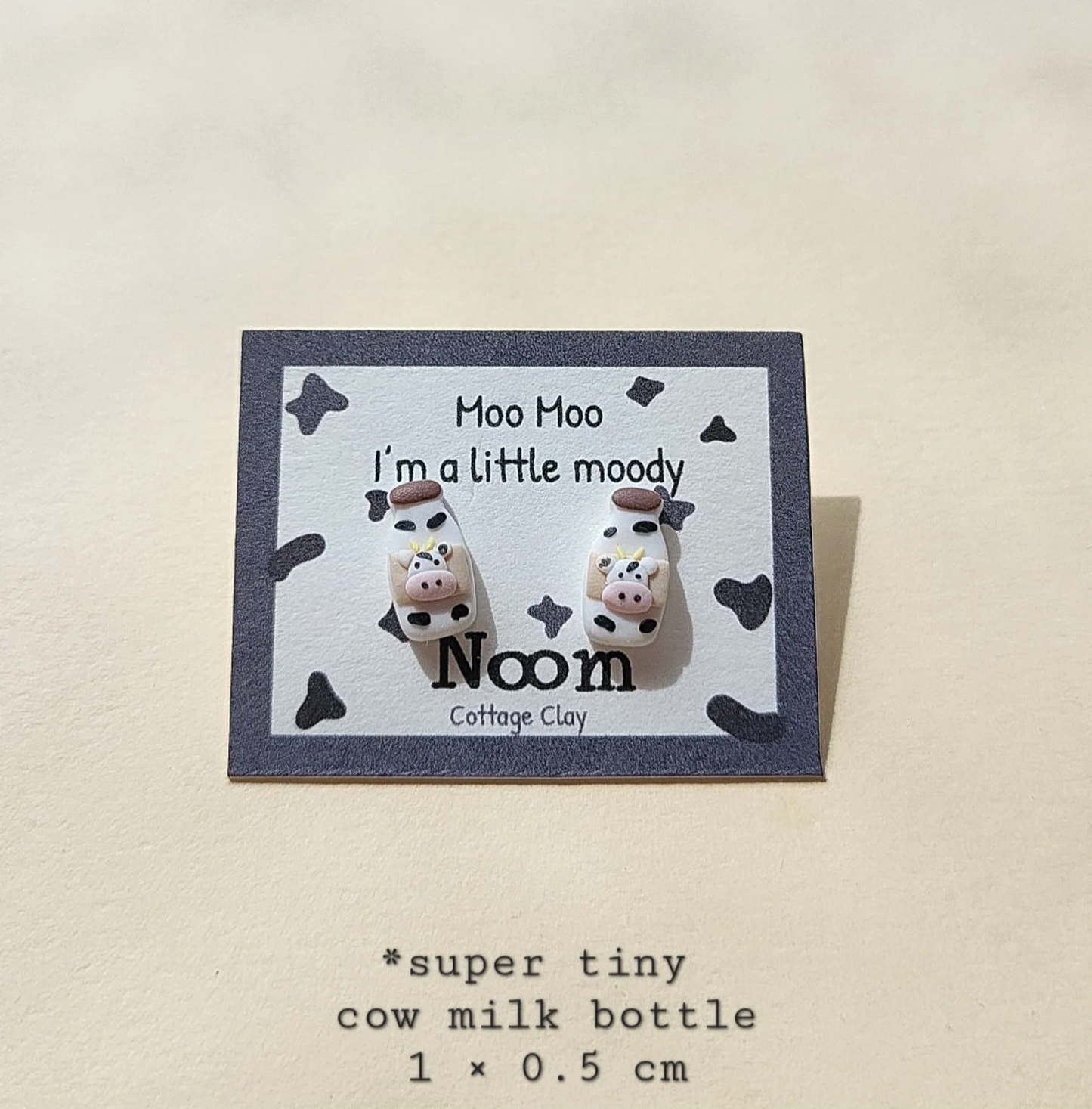 tiny cow milk bottle stud earrings