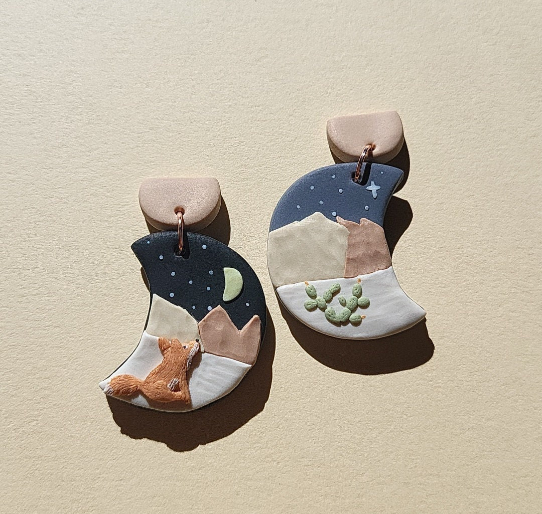 mismatched landscape earrings