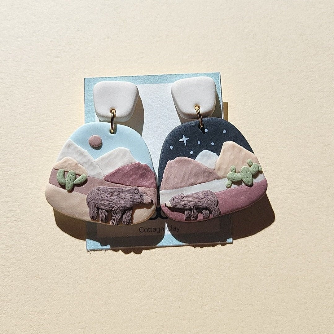 Grizzly bear earrings in desert