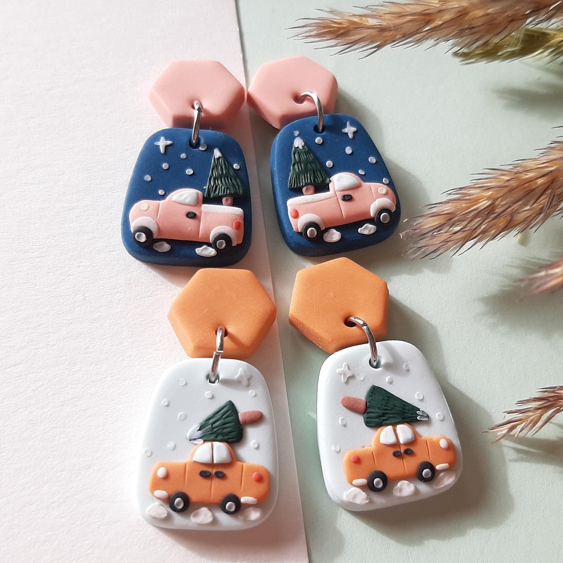 Christmas tree earrings in car / truck. Handmade from polymer clay with surgical stainless steel ear posts & backings. They are fun and cute holiday earrings for girls and women.