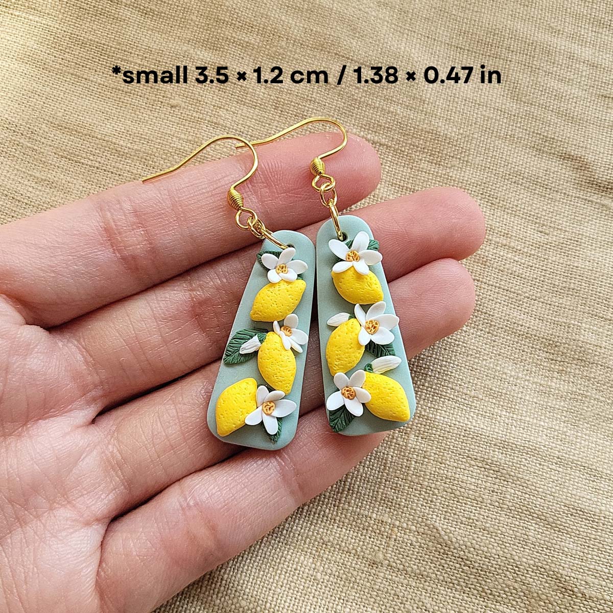 Handmade lemon and white flower polymer clay earrings - Rankų darbo auskarai su citrinų ir gėlių motyvais.