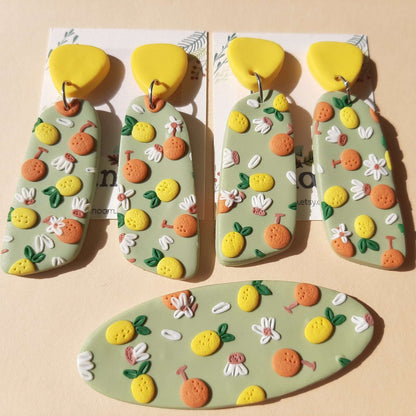 Lemon and orange polymer clay earrings & hairclip - Rankų darbo auskarai ir plaukų segtukas „Citrinos ir apelsinai“ iš polimerinio molio.