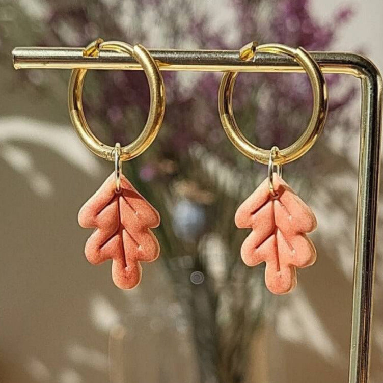 Oak leaf polymer clay earrings in orange color