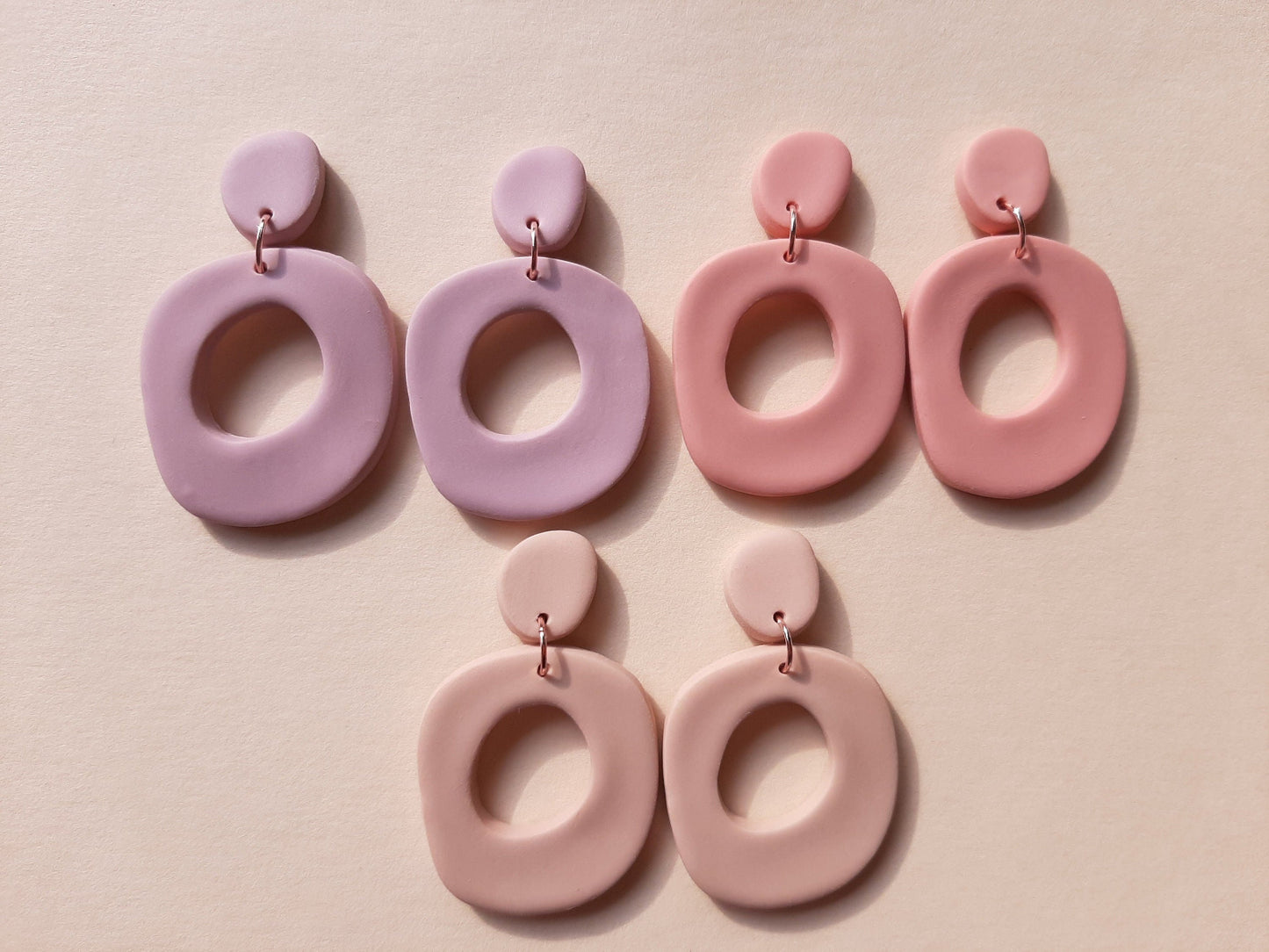 Neutral color earrings clay