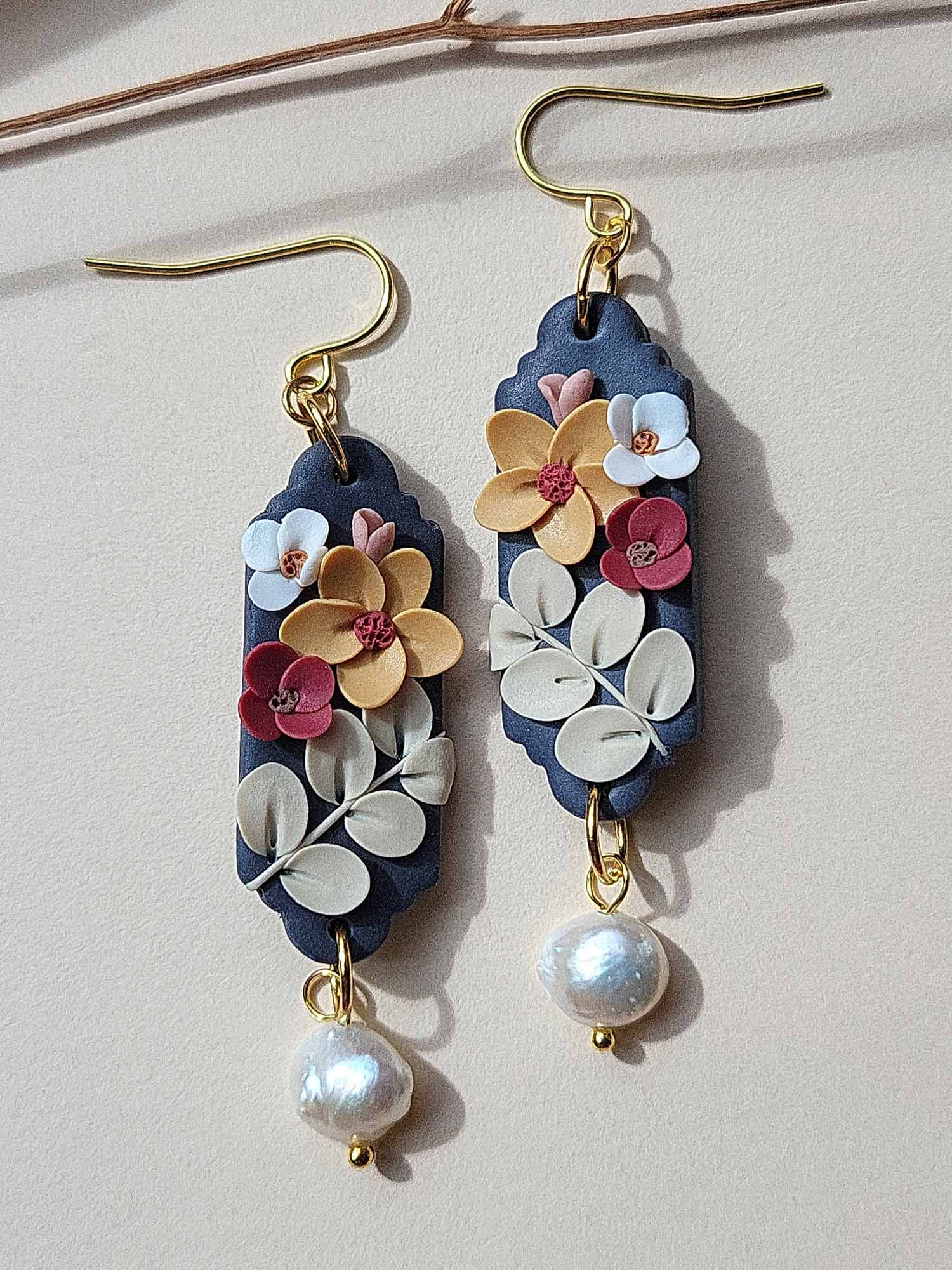 Polymer clay flower earrings with white pearls