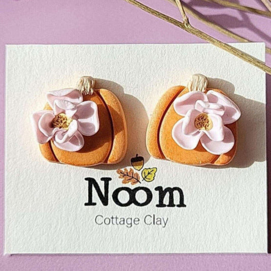 Pumpkin stud earrings with flower