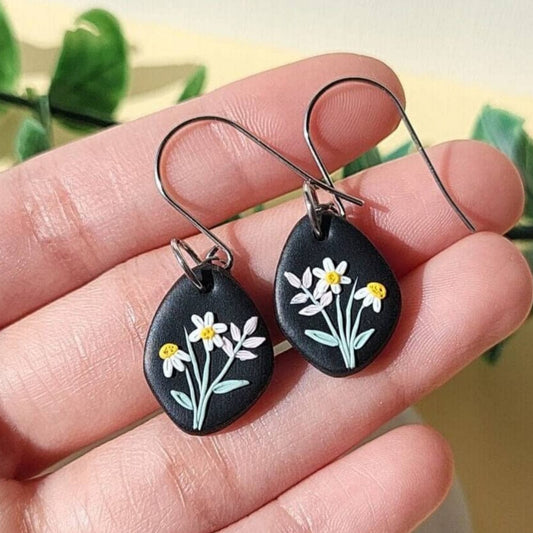 Small dangle drop daisy earrings