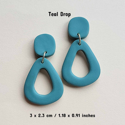 Teal clay earrings
