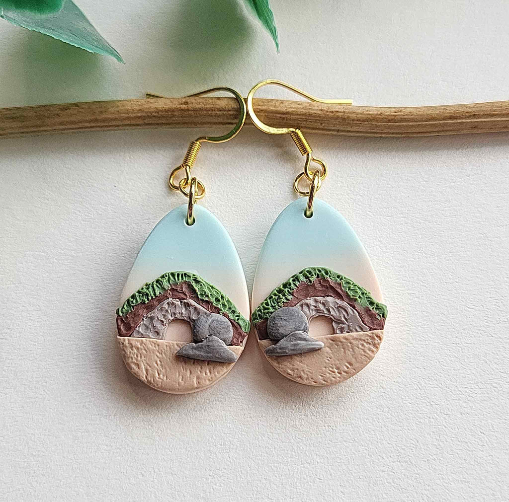 Resurrection earrings are handmade from polymer clay with surgical stainless steel ear wires. 