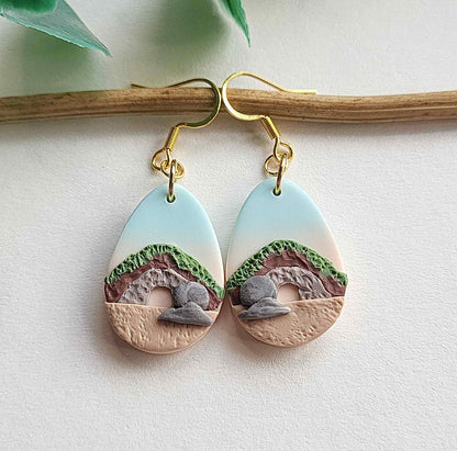 Resurrection earrings are handmade from polymer clay with surgical stainless steel ear wires.