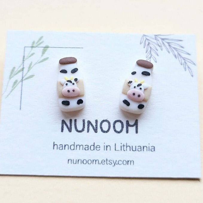 Tiny cow milk stud earrings