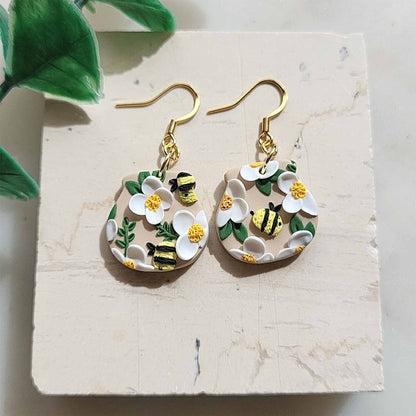Dangle floral earrings clay